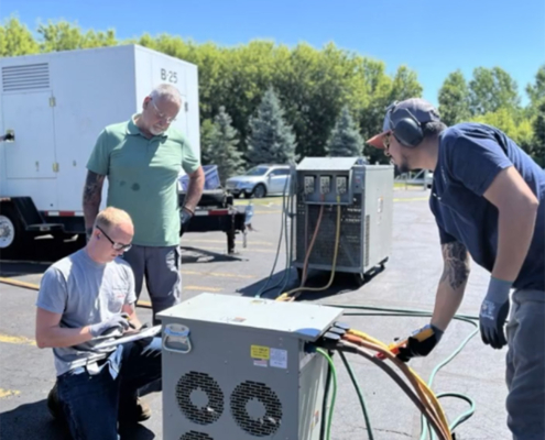 Workers Installing Generator