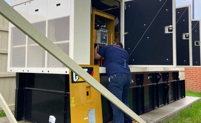 employee working on open cat panel